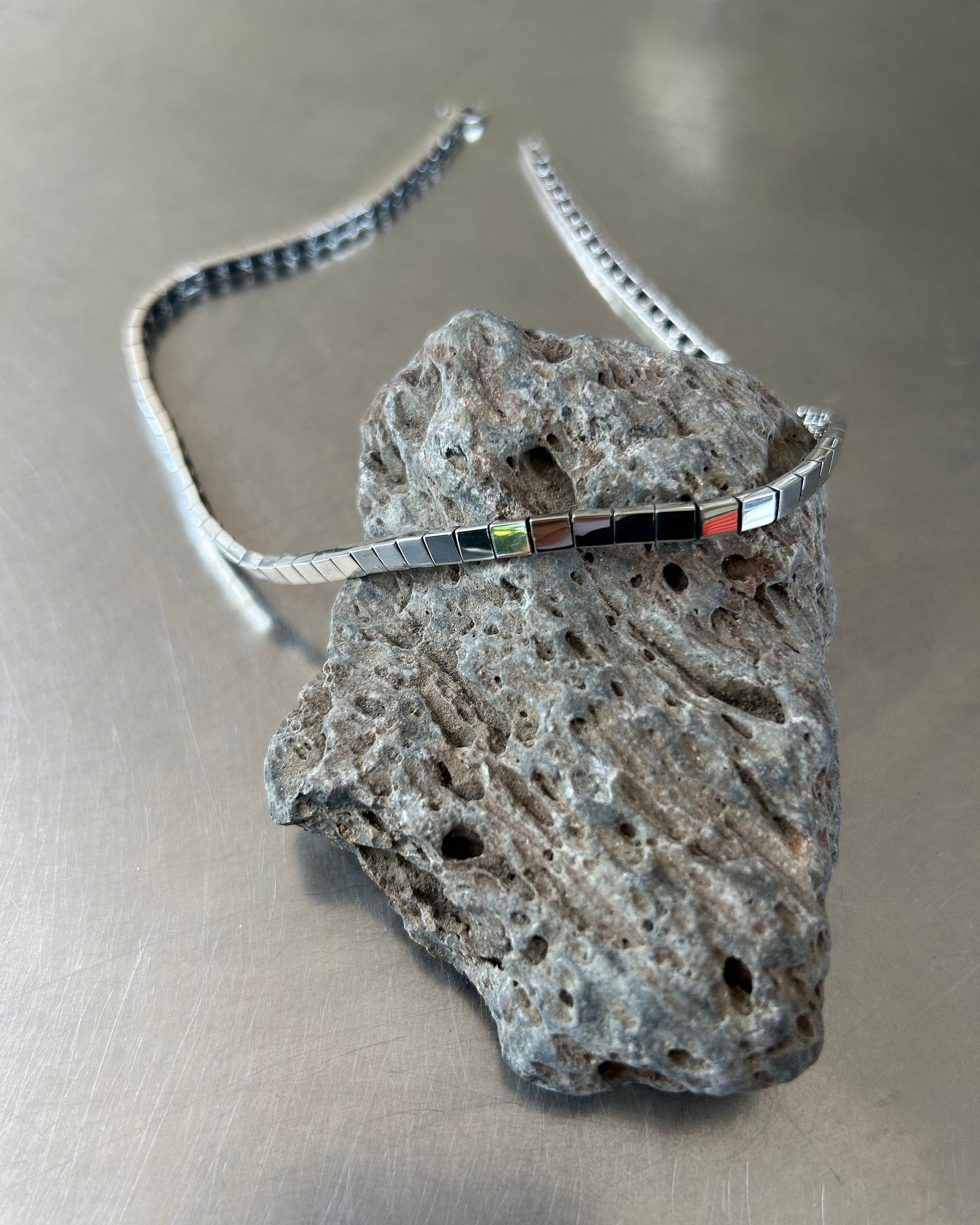 Close-up of sterling silver box link necklace chain and details