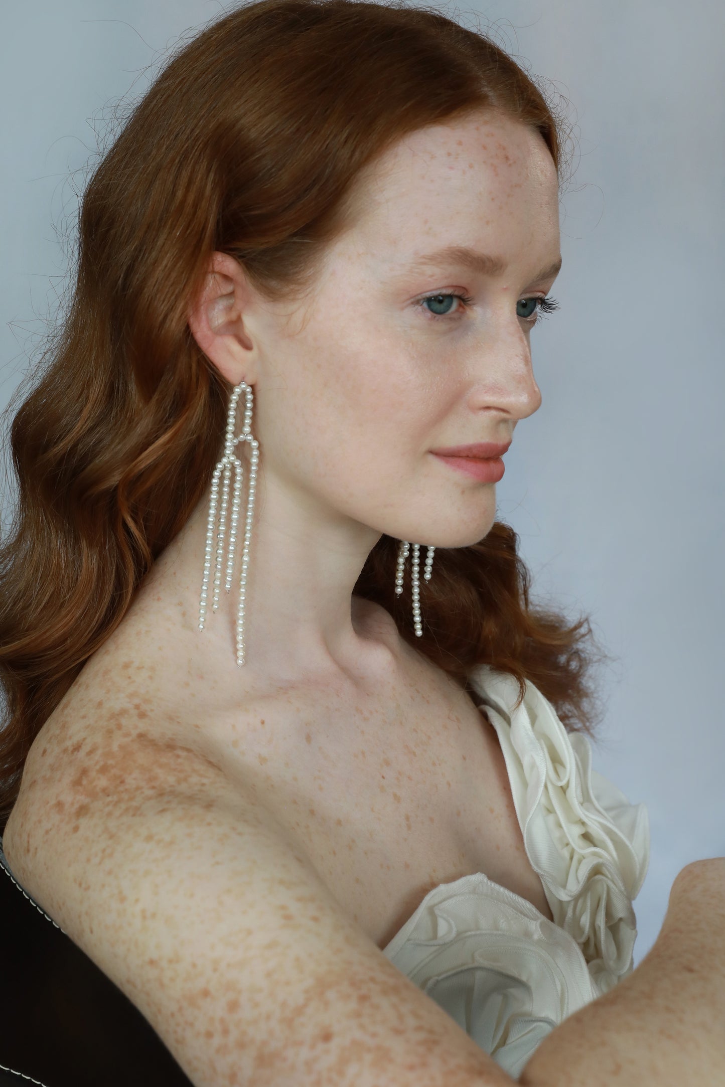 white real natural freshwater pearl long dangle shoulder duster earrings sterling silver silver pushback closure art deco contempary bride wedding model photo