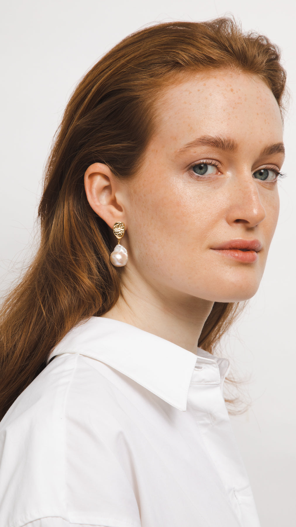 white real natural freshwater baroque pearl hoop huggie earrings gold filled gold pushback closure classic modern bride wedding model photos