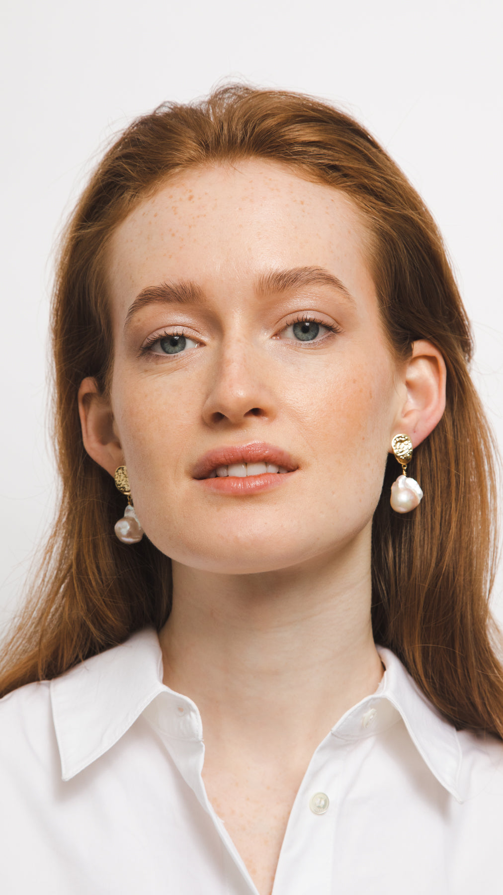 white real natural freshwater baroque pearl hoop huggie earrings gold filled gold pushback closure classic modern bride wedding model photo