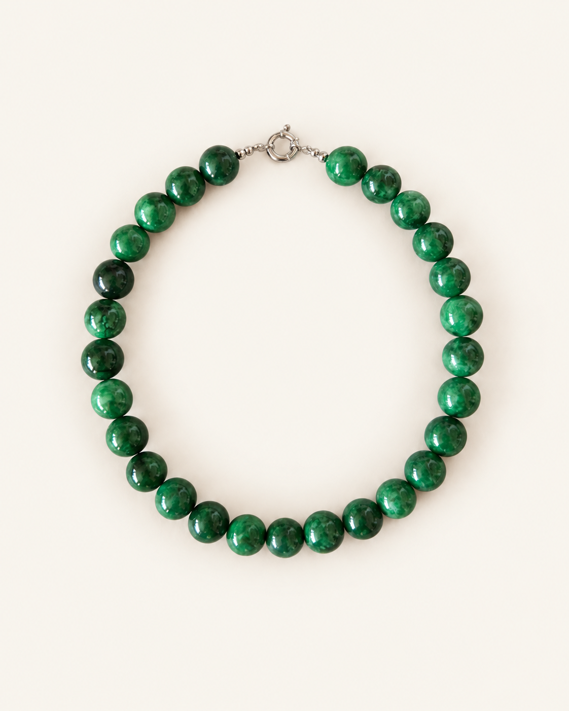 Handcrafted 14mm green chalcedony beaded choker necklace with natural stone beads and silver clasp on a cream background.