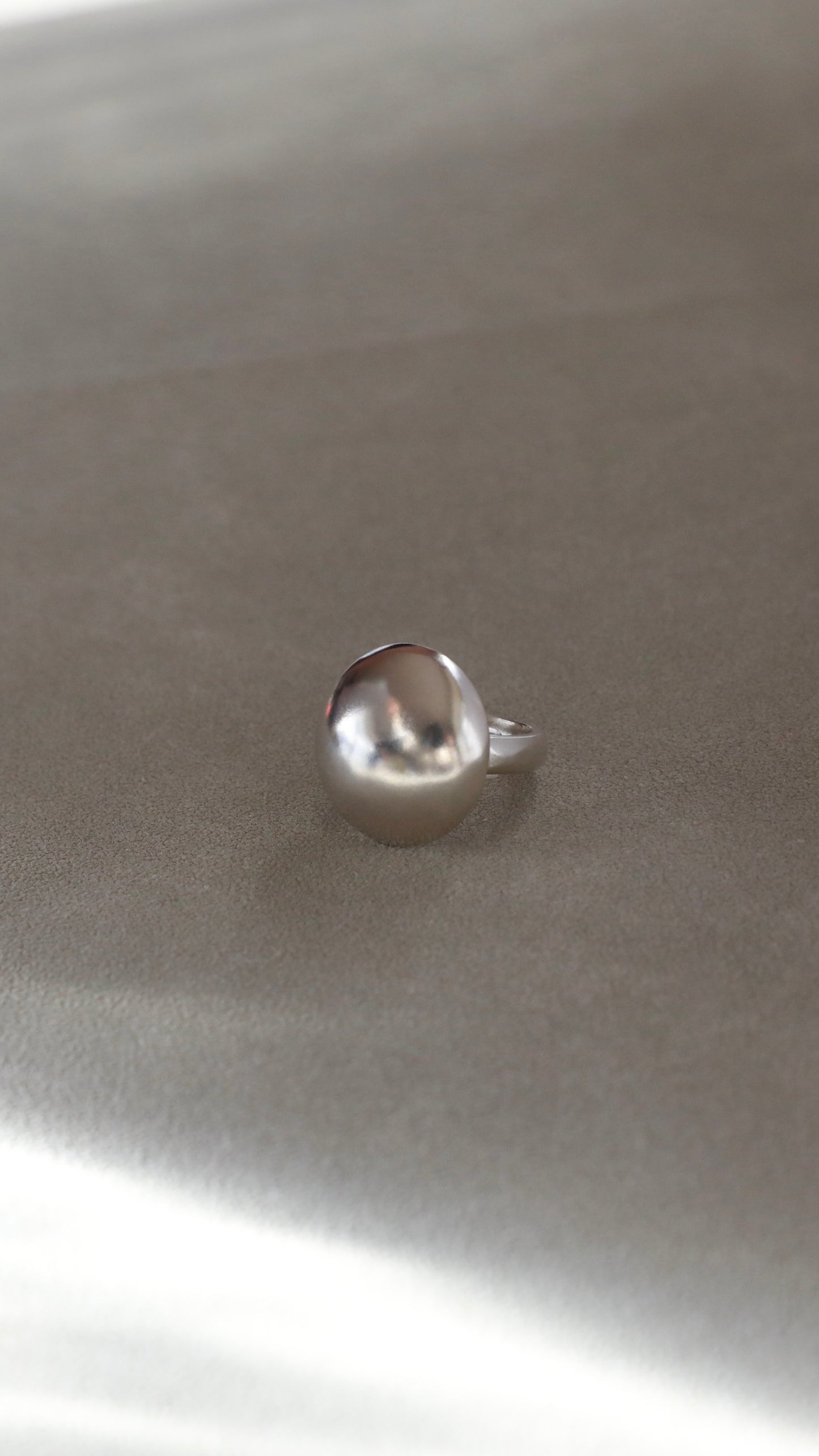 Sculptural silver dome ring with high-shine finish for everyday wear