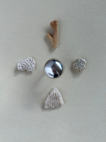 Sculptural silver dome ring with high-shine finish for everyday wear
