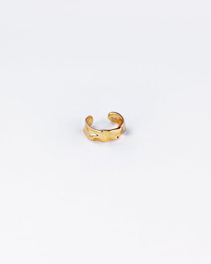 18K gold plated sterling silver ear cuff on white background, showcasing wavy textured surface
