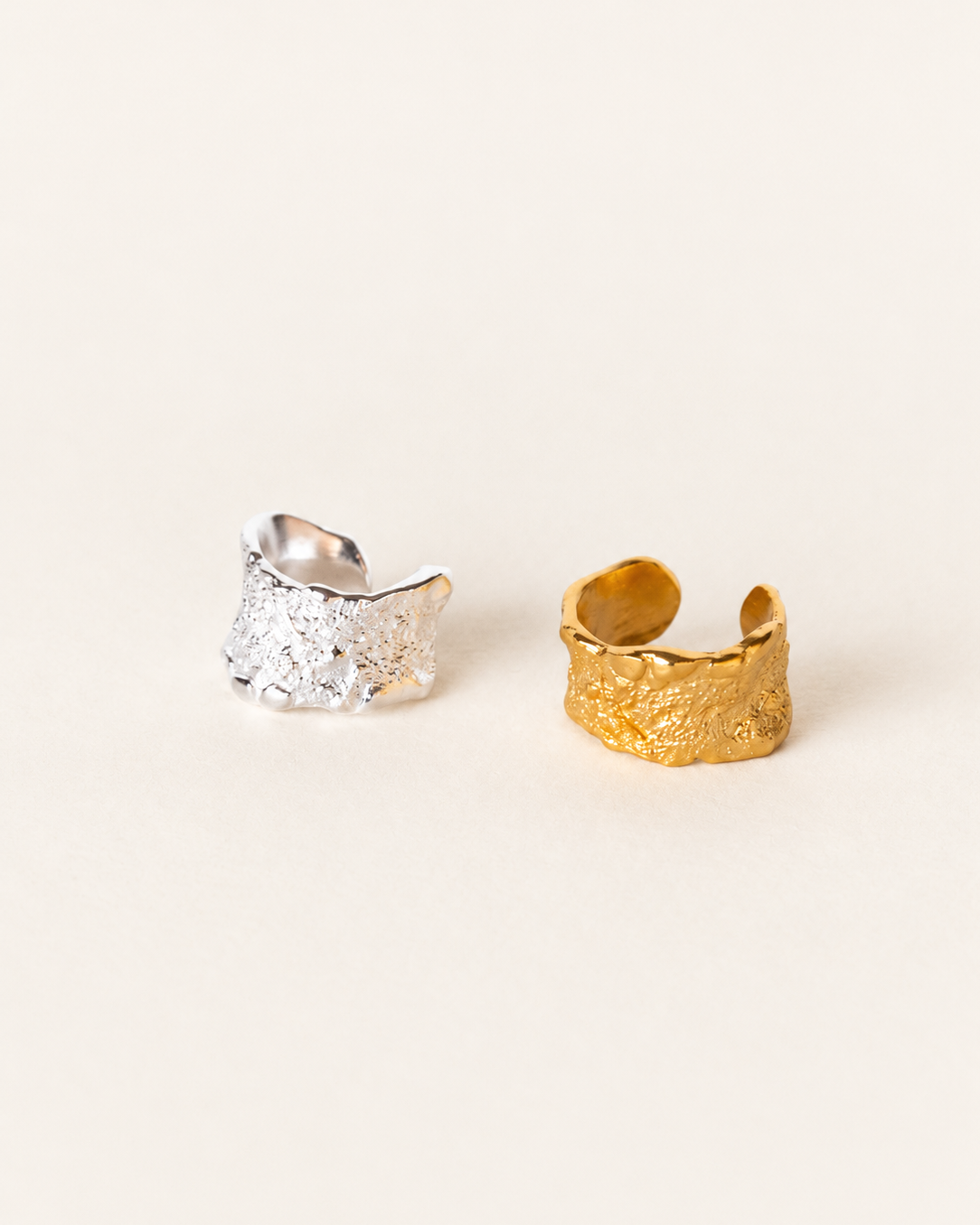 Adjustable sterling silver ear cuff with organic textured finish, nickel-free and designed for non-pierced ears.