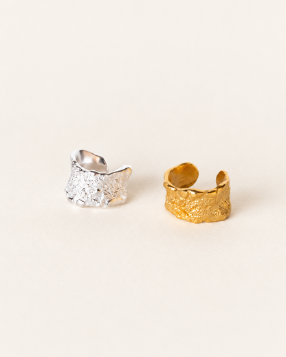 Adjustable sterling silver ear cuff with organic textured finish, nickel-free and designed for non-pierced ears.
