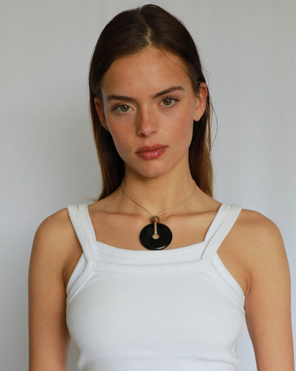 Super long adjustable necklace with polished black onyx pendant, natural picture jasper bead, and beige wax rope cord.