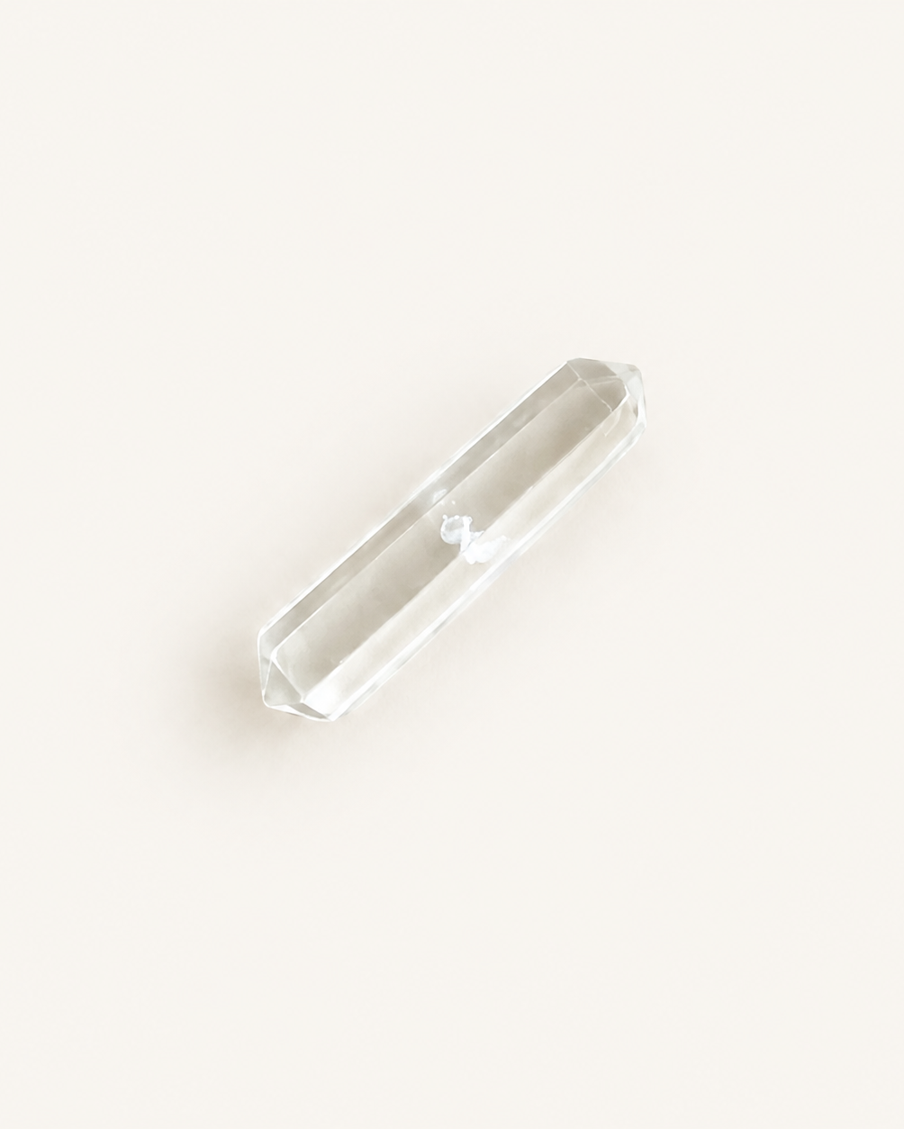 necklace-polished-point.jpg	Hand-polished transparent clear quartz point with no visible inclusions