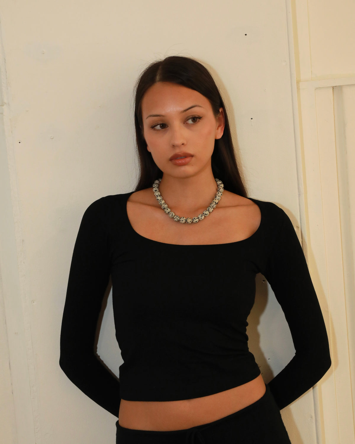 Chunky Dalmatian stone bead necklace with adjustable silver clasp in Nordic minimalist style