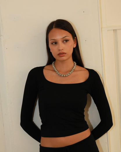 Chunky Dalmatian stone bead necklace with adjustable silver clasp in Nordic minimalist style