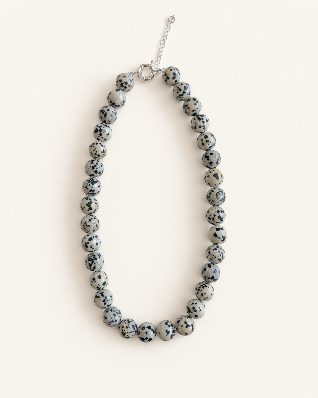 Chunky Dalmatian stone bead necklace with adjustable silver clasp in Nordic minimalist style product photo 
