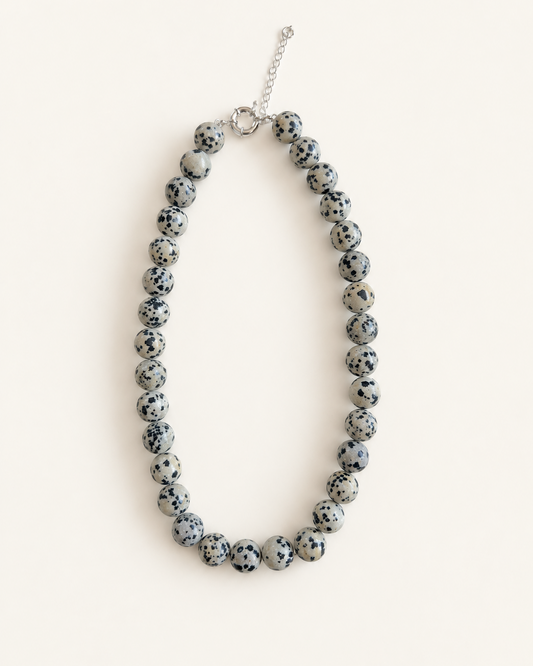 Chunky Dalmatian stone bead necklace with adjustable silver clasp in Nordic minimalist style product photo 