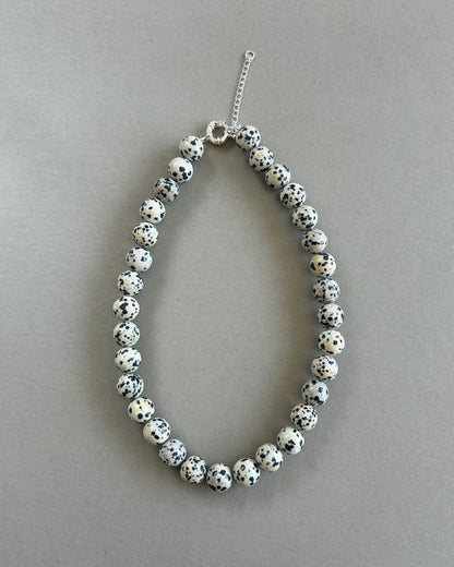 Chunky Dalmatian stone bead necklace with adjustable silver clasp in Nordic minimalist style product photo 