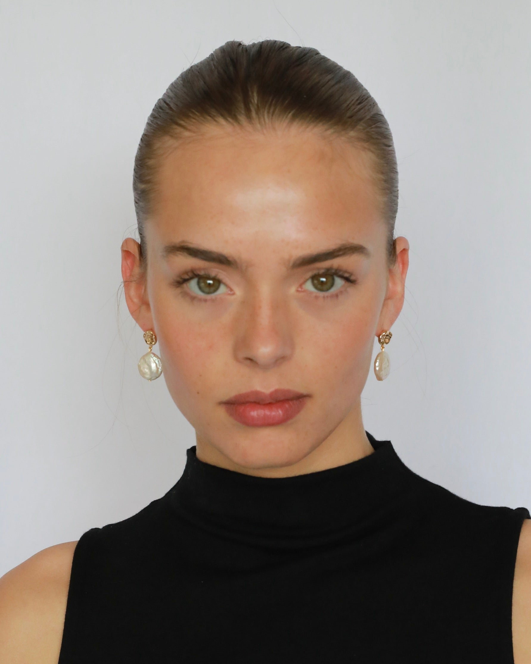 Freshwater pearl earrings with coin shape flat real pearls, 14K gold plated brass, and sterling silver pins
