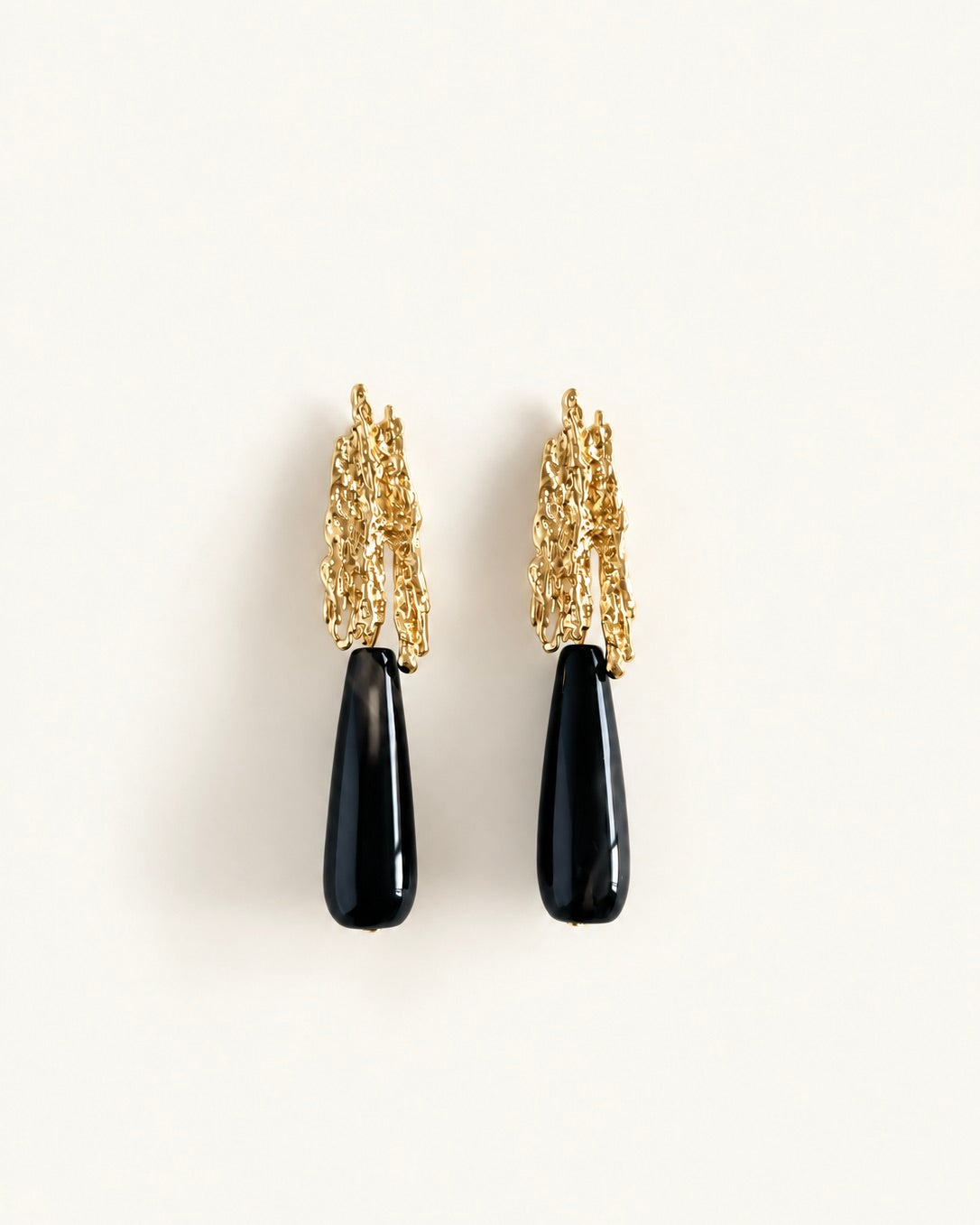 Natural black onyx teardrop earrings with textured gold-plated brass