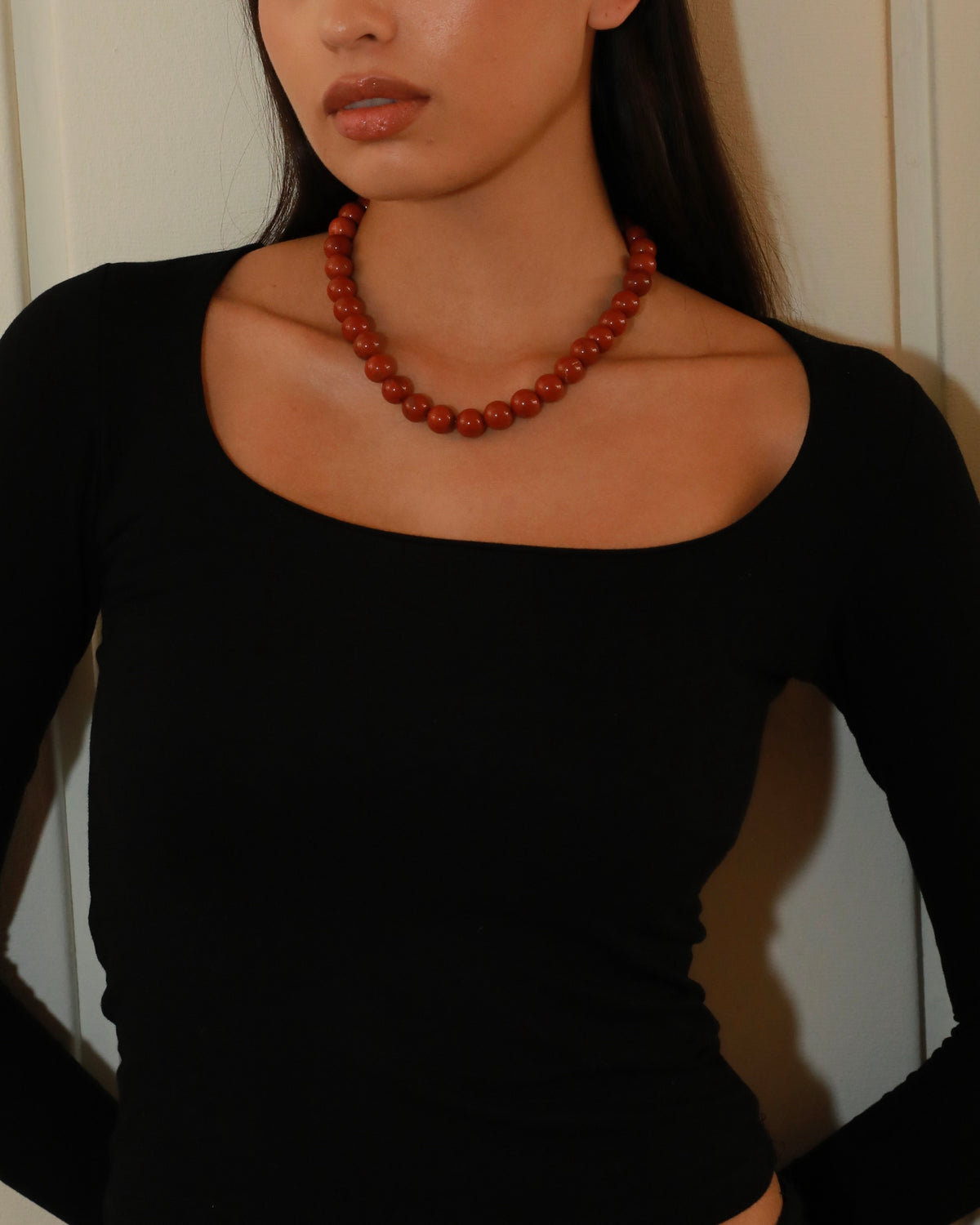 12mm natural red stone beaded necklace with matte red beads and Nordic minimalist design.