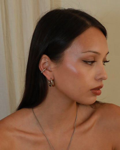 Minimalist stainless steel organic shaped hoop earrings with Nordic design