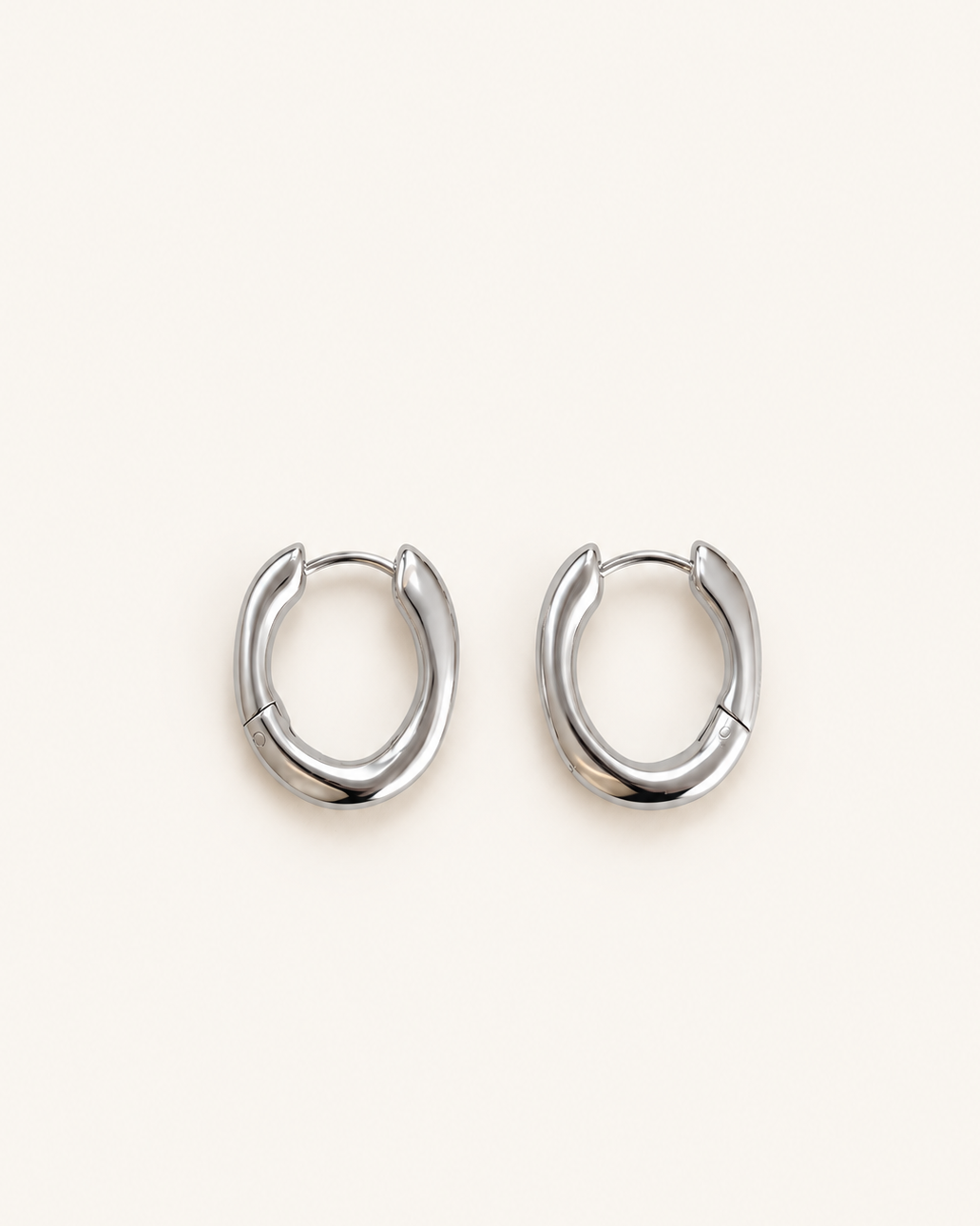Minimalist stainless steel organic shaped hoop earrings with Nordic design