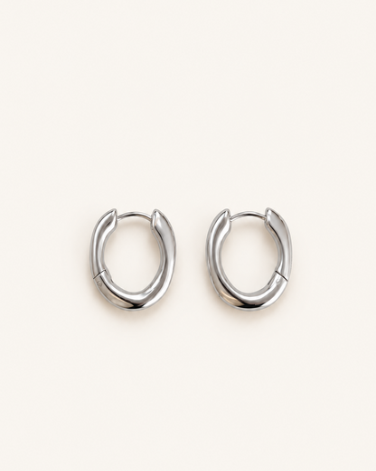 Minimalist stainless steel organic shaped hoop earrings with Nordic design