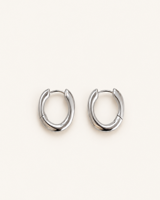 Minimalist stainless steel organic shaped hoop earrings with Nordic design