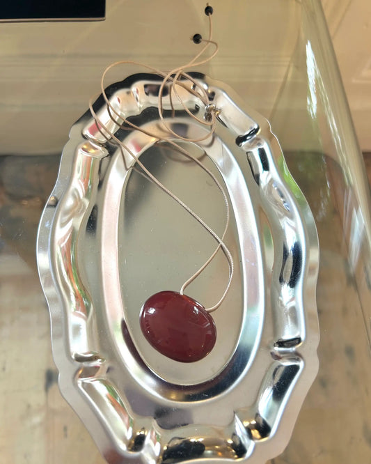 Red agate energy stone pendant necklace with adjustable cream cord in Nordic minimalist style
