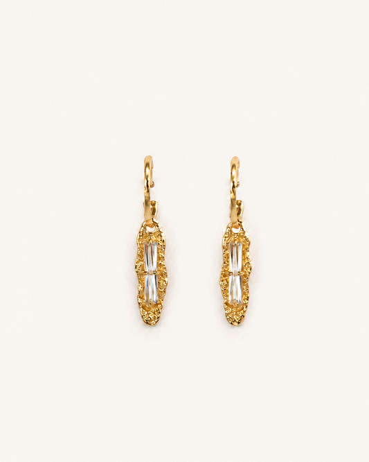 Refined Gleam gold drop earrings with clear baguette-cut cubic zirconia stones, textured organic pendants and polished gold hoops.