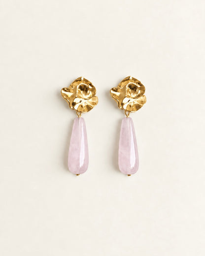 Gold-tone sculptural flower drop earrings with translucent pale rose quartz stones