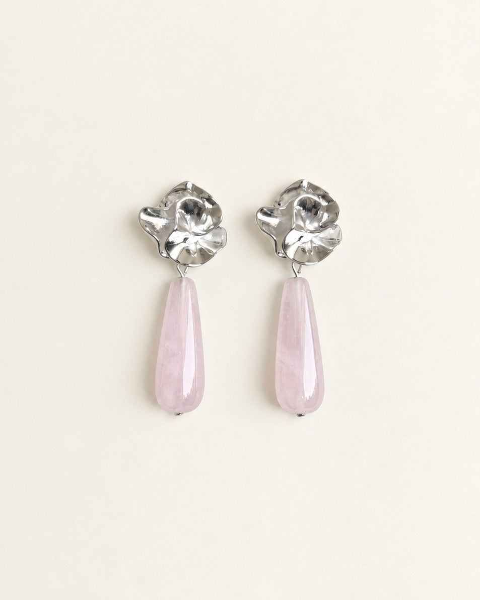 Silver-tone sculptural flower drop earrings with translucent pale rose quartz stones
