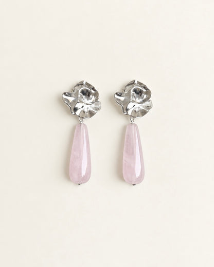 Silver-tone sculptural flower drop earrings with translucent pale rose quartz stones

