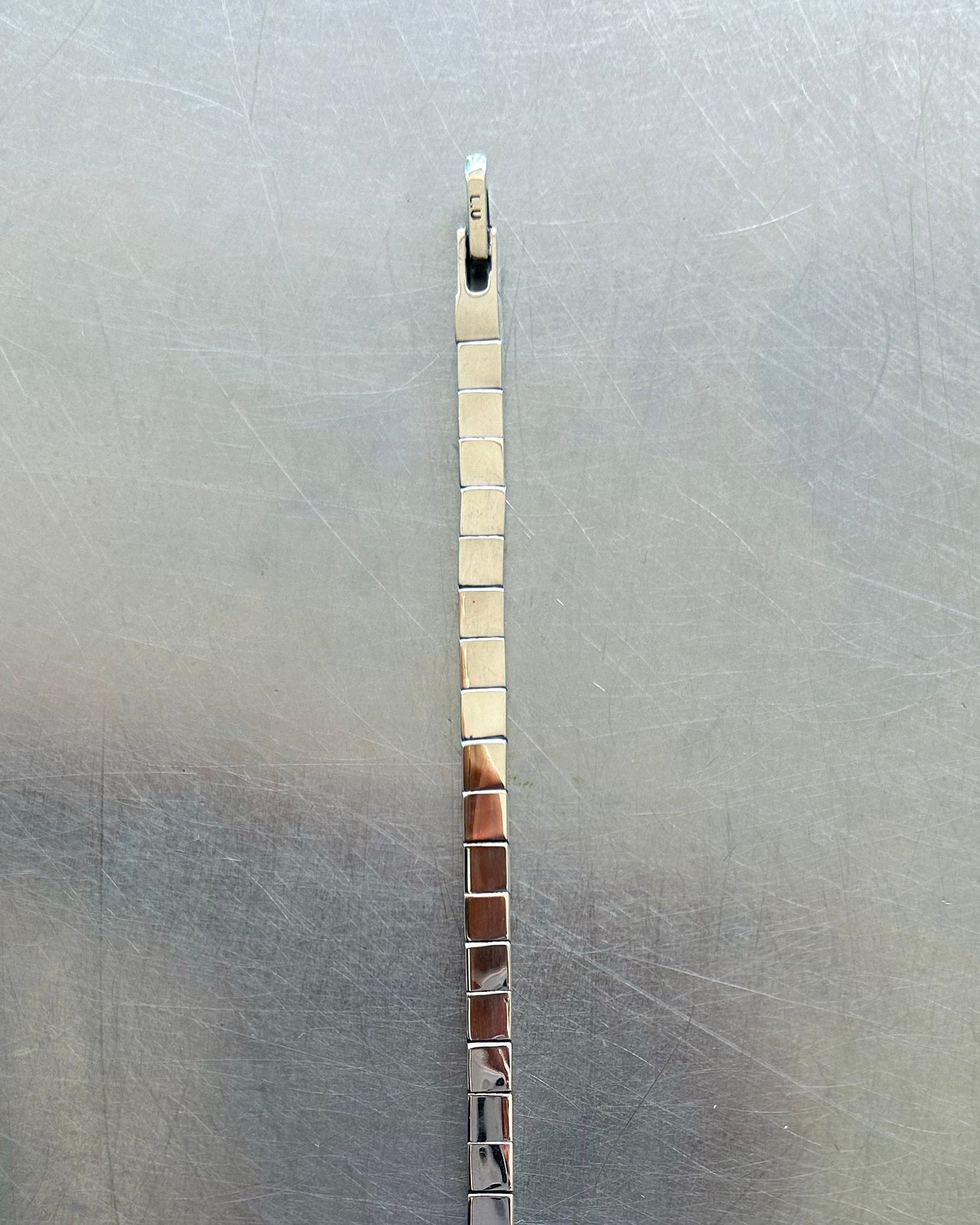 Clasp and chain detail of sterling silver box link necklace